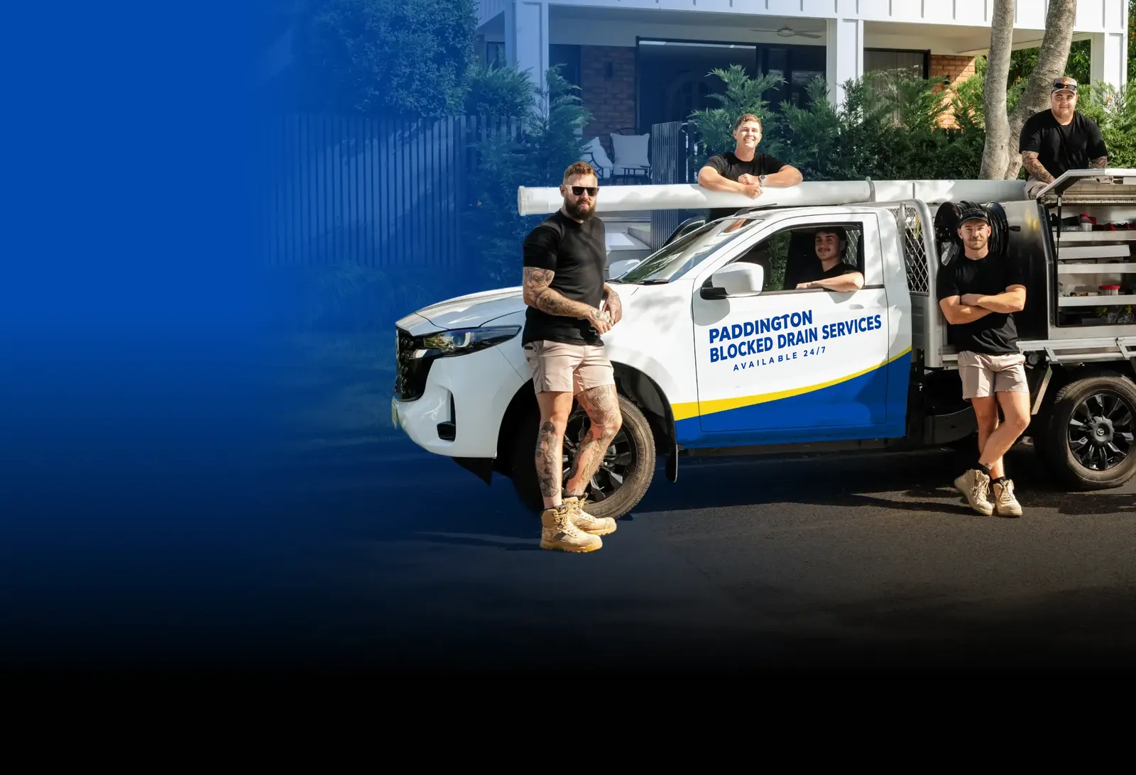 Paddington Blocked Drain Services team with the ute